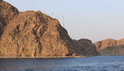 Fototapeta na wymiar Egyptian mountains on the coast of the sea