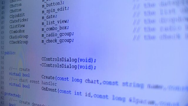Lines of programmes code run across the white screen. Hacker tries to break security and commit data theft. Closeup