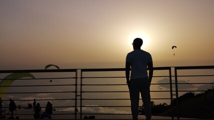 silhouette of a person high in mountain