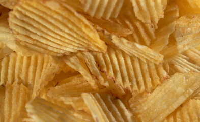potato chips scattering ,close up shot for textures or background