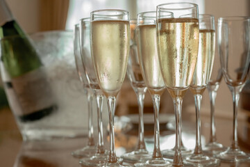 glasses of champagne with sparkles 