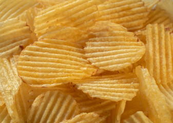 potato chips scattering ,close up shot for textures or background