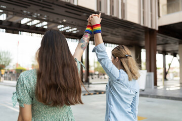 Gay young couple supporting LGBT rights