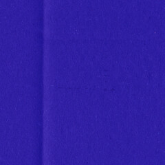 Fototapeta premium A violet vintage rough sheet of carton. Recycled environmentally friendly cardboard paper texture. Simple minimalist papercraft background.