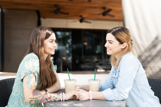 Young gay couple on a coffee date