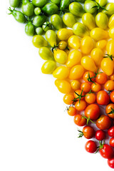 The harvest of tomatoes. Different color and varieties of tomatoes on a white background. Healthy...