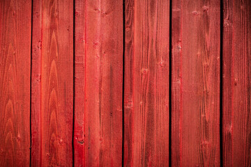 Red wooden grunge board closeup. Natural texture. Can be used like nature background