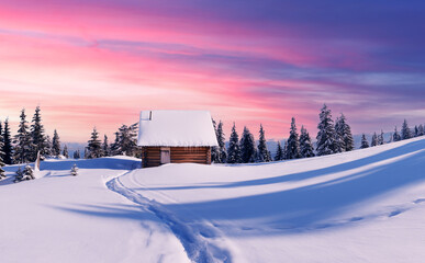 Fototapeta na wymiar Fantastic winter landscape with wooden house in snowy mountains. Christmas holiday concept. Carpathians mountain, Ukraine, Europe