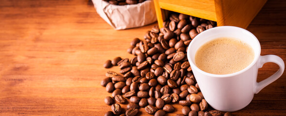 Fresh cafe for morning breakfast refresh caffeine white cup roasted organic coffee bean farm in vintage wood grinder classic metal coffee pot for black espresso and cream milk cappuccino latte