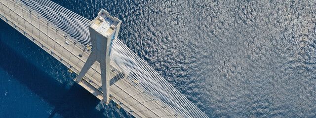 Aerial drone ultra wide panoramic photo of famous cable anti seismic bridge of Rio Antirio, Greece