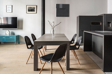 Modern dining table in loft apartment