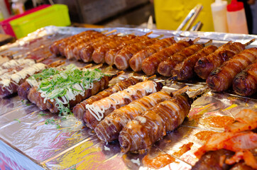 Rice wrapped with bacon; Japanese street food