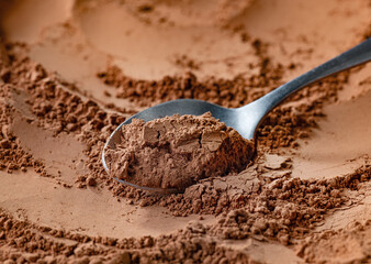 spoon of cocoa powder
