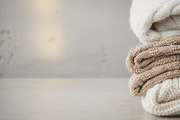 Warm Winter Female Woolen Knitted Sweaters Stack Background Women Fashion Composition Close Up Copy Space