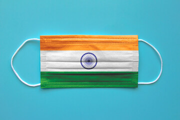 A face mask with a Indian Flag on a clear background. Concept: India during pandemic.