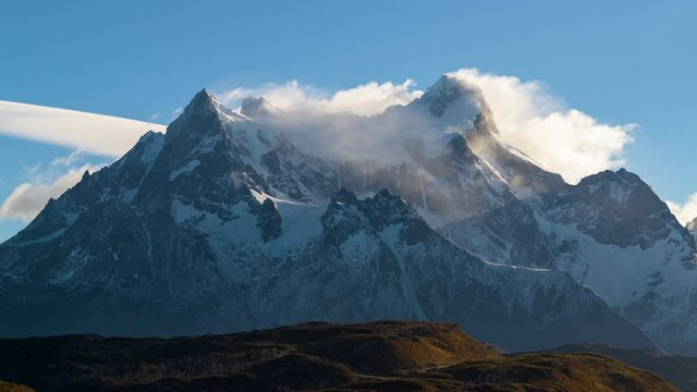time lapse Ice covered peaks and clouds over Cerro Paine Grande in southern Chilean Patagonia, Torres del Paine