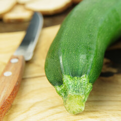 Zucchini on a wooden cutting board
