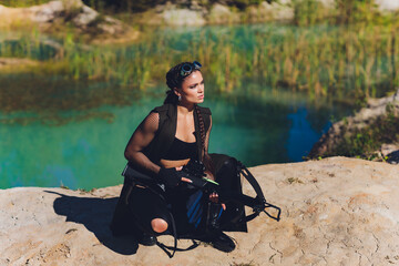 Athlete aiming Young woman holding the crossbow.