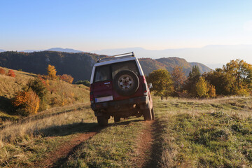 Suv offroad driving in mountains