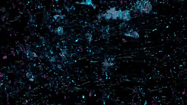 Water splashing on black background, super slow motion. Filmed on high speed cinema camera, 1000 fps.
