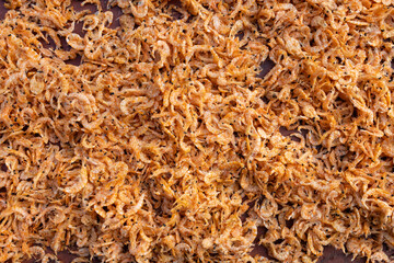 raw shrimps being air dried as background