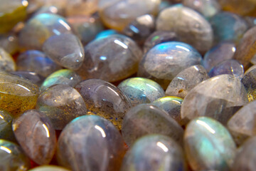 Beautiful and rare labradorite Lay on the ground