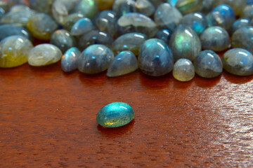 Beautiful and rare labradorite Lay on the ground