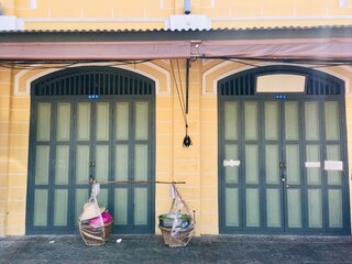Old wooden door vintage ancient style exterior of Thai house in Bangkok city