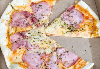 one pizza stuffed with ham