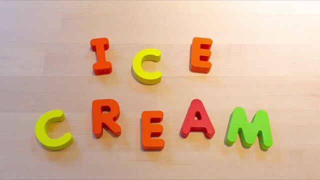Ice cream text stop motion animation, jumping words for celebration concept. Social media footage. holiday celebration creative image. Descriptive seamless looping video for b-roll or title
