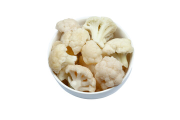 Frozen cauliflower florets in a bowl isolated on white backgroung, top view