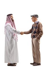 Full length profile shot of a saudi arab man shaking hands with an elderly man