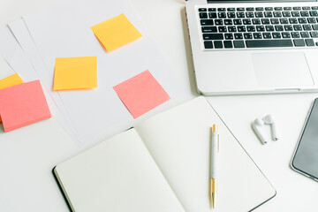 Top view - Minimal working desk in office.