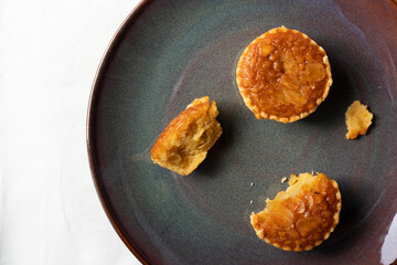almond bakery pie cup desert food on black dark ceramic background