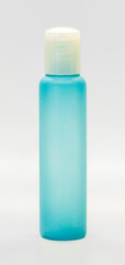 Blue pastel bottle on a white background to use as part of your graphic design, label or advertisement.