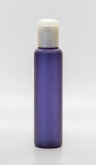 Purple pastel bottle on a white background to use as part of your graphic design, label or advertisement.