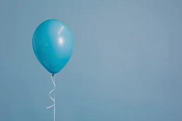 Foto op Canvas Blue single balloon with a string © Rawpixel.com