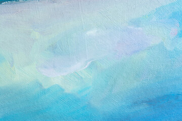 Blue background with oil paint. Beautiful close - up brushstrokes. Textured abstract background. Oil painting on cardboard and canvas. Winter and Christmas concept. Layout for greetings.