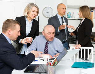 Business people working and communicating together in meeting room