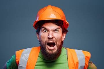 Angry worker in construction forum emotions cropped view autumn background