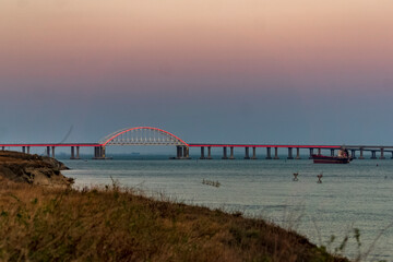Fototapeta na wymiar Crimean bridge road across Kerch Strait