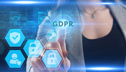 Business, Technology, Internet and network concept. Young businessman working on a virtual screen of the future and sees the inscription: GDPR