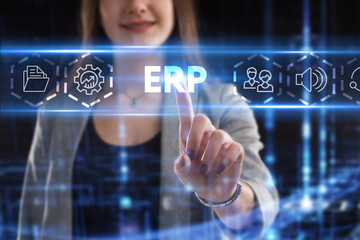 Business, Technology, Internet and network concept. Young businessman working on a virtual screen of the future and sees the inscription: ERP