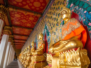 In the inner hallway of Wat Arun, there is a Buddha image on the side of the wall showing the Thai...