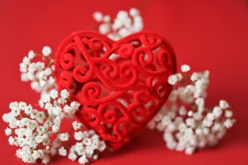 Valentine's day holiday card. Love and feelings concept.Decorative red heart and white gypsophila...