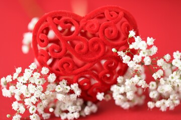 Valentine's day holiday card. Love and feelings concept.Decorative red heart and white gypsophila...