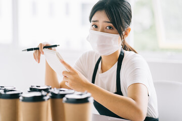 The Asian coffee shop owners were upset because their shops were closed due to the effects of the disease
