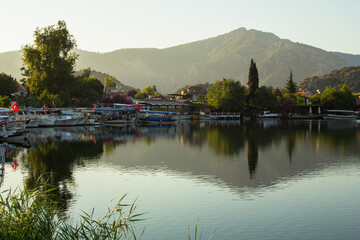 View of the river and boats at sunrise.