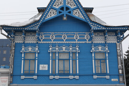 Wooden house with carved windows in Sverdlov Street, 2, Syzran city (Russia). Former house of merchant Chernukhin, branch of Syzran museum of local lore. Architecture