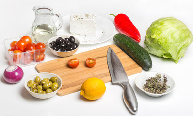 products for Greek salad on a white background